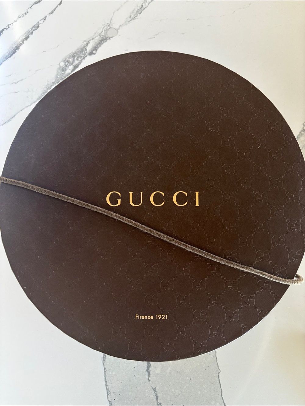 Gucci Brown Round Hat Box with Gold Logo and Cord
